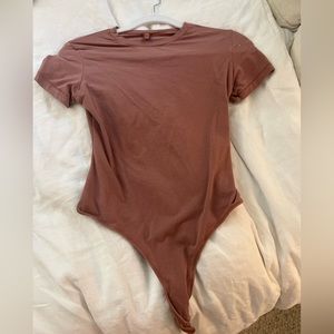 Skims Fits Everybody T-Shirt Bodysuit in Pink